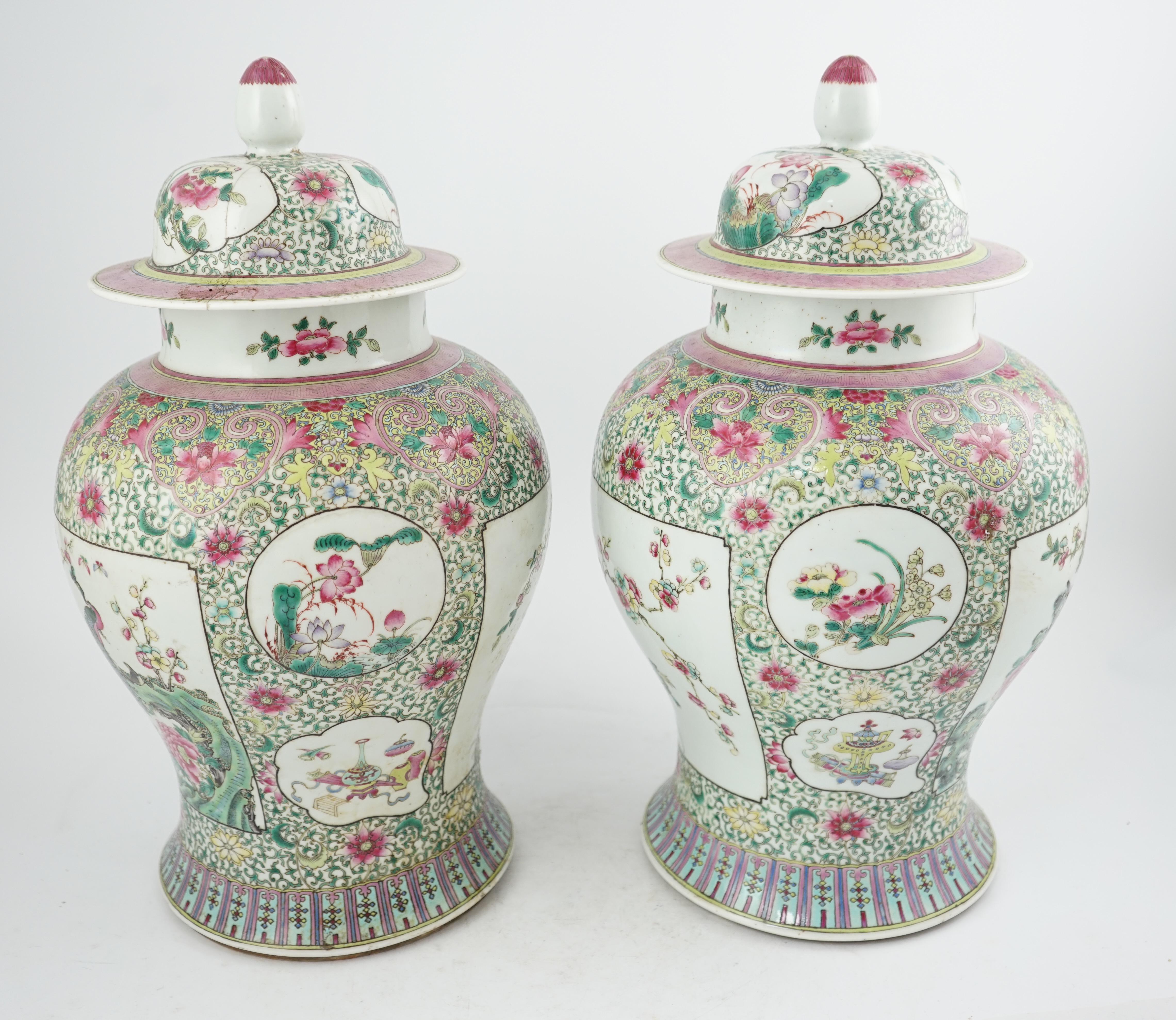 A pair of large Chinese famille rose baluster jars and covers, Qianlong seal mark, but late 19th century